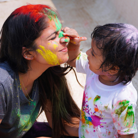 Family celebrating Holi