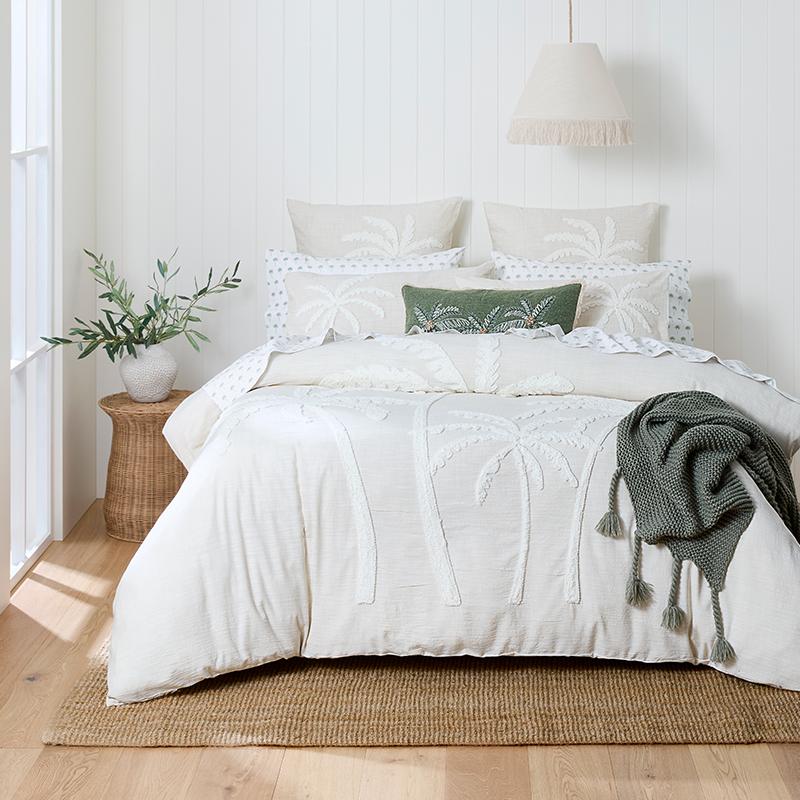 Bed Bath N' Table bedroom set up with quilts and pillows